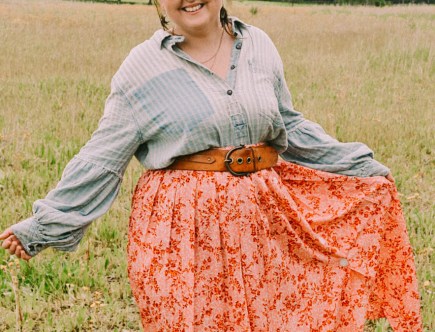 Free People denim puff sleeve shirt with western belt, cowboy boots and ASOS floral midi skirt