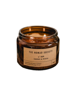 Smoke and wood scented candle