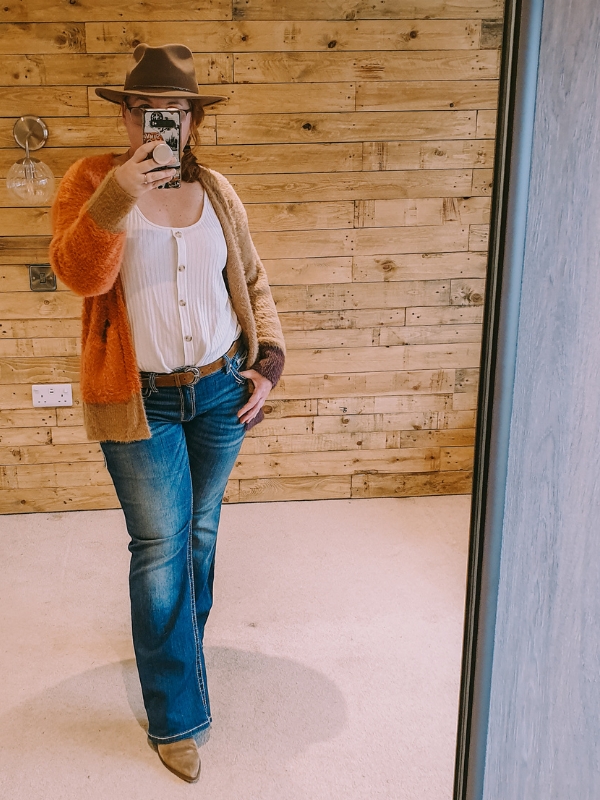 Mel Fielden, Melbelle Founder wearing western cardigan, Ariat jeans and fedora