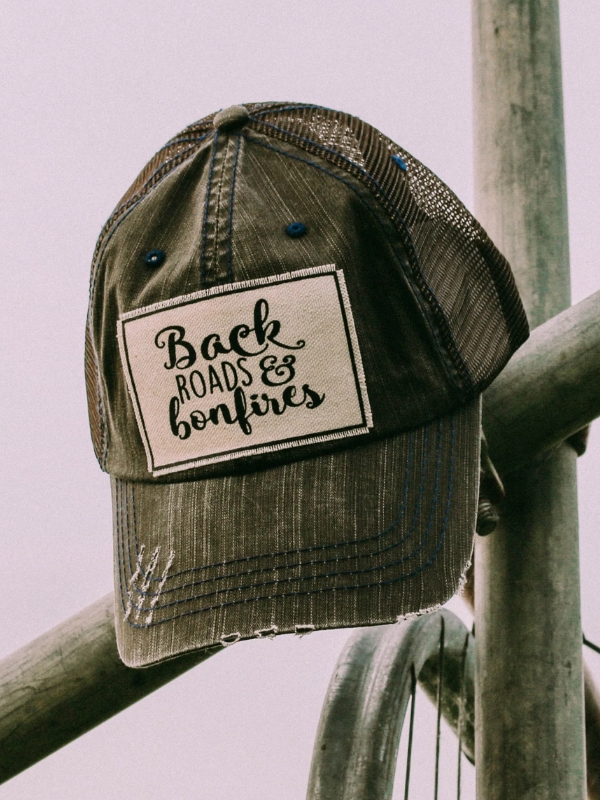 Back roads and bonfires trucker cap