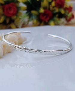 Handmade hammered sterling silver bangle